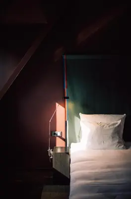 Ein Bett oder Betten in einem Zimmer der Unterkunft ANAGRAM - Haus im Tal