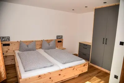 Ein Bett oder Betten in einem Zimmer der Unterkunft Ferienhof Dirnberg