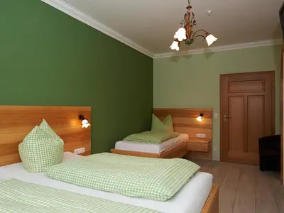 Ein Bett oder Betten in einem Zimmer der Unterkunft Ferienhof Dirnberg