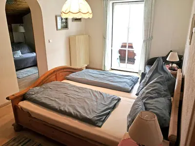 Ein Bett oder Betten in einem Zimmer der Unterkunft Pension Brucker