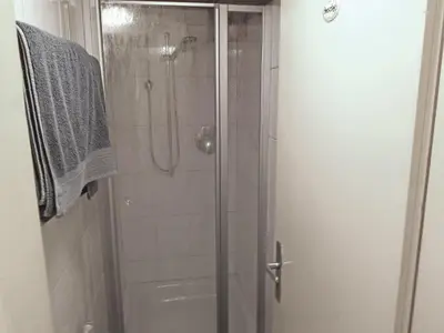 Ein Badezimmer in der Unterkunft Pension Brucker