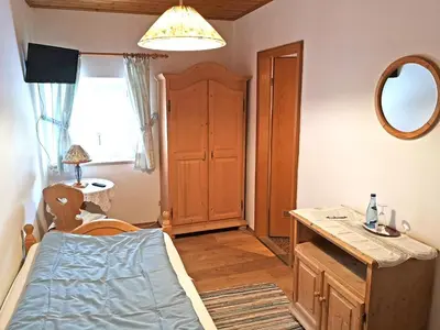 Ein Bett oder Betten in einem Zimmer der Unterkunft Pension Brucker
