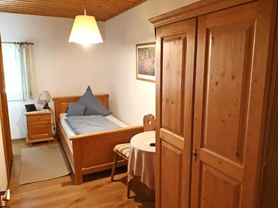 Ein Bett oder Betten in einem Zimmer der Unterkunft Pension Brucker