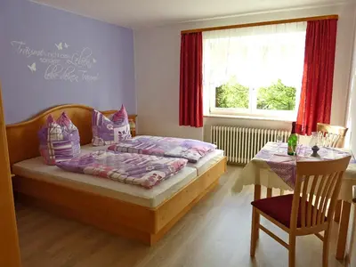 Ein Bett oder Betten in einem Zimmer der Unterkunft Ferienwohnung Kaiserblick
