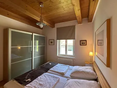Ein Bett oder Betten in einem Zimmer der Unterkunft Ferienwohnung Johannsen Haus Elisabeth