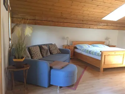 Ein Bett oder Betten in einem Zimmer der Unterkunft Alpaka-Hof Landinger