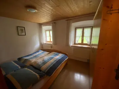 Ein Bett oder Betten in einem Zimmer der Unterkunft Alpaka-Hof Landinger