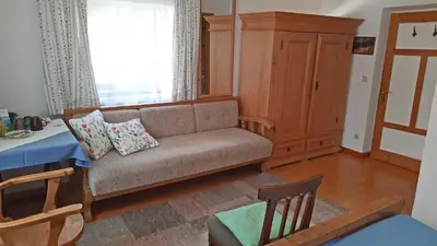 Ein Sitzbereich in der Unterkunft Bauernhof Auerhof