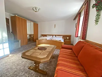 Ein Sitzbereich in der Unterkunft Bauernhof Daurerhof Ferienwohnung