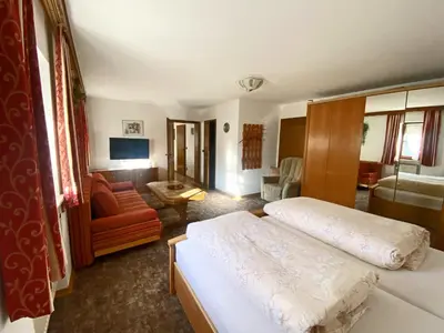 Ein Bett oder Betten in einem Zimmer der Unterkunft Bauernhof Daurerhof Ferienwohnung