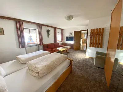 Ein Bett oder Betten in einem Zimmer der Unterkunft Bauernhof Daurerhof Ferienwohnung