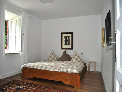 Ein Bett oder Betten in einem Zimmer der Unterkunft Ferienwohnungen Schlosseinkehr
