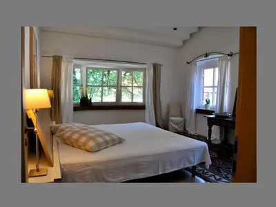 Ein Bett oder Betten in einem Zimmer der Unterkunft Ferienwohnungen Schlosseinkehr