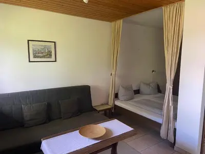 Ein Bett oder Betten in einem Zimmer der Unterkunft Ferienwohnung Samerhof Langenscheidt