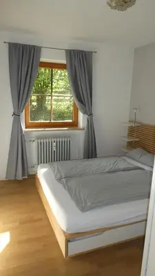 Ein Bett oder Betten in einem Zimmer der Unterkunft Ferienwohnung Dillmann