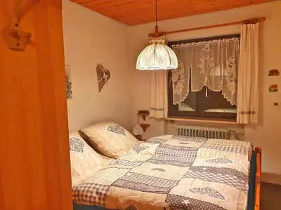 Ein Bett oder Betten in einem Zimmer der Unterkunft Alpenresidenz Ruda