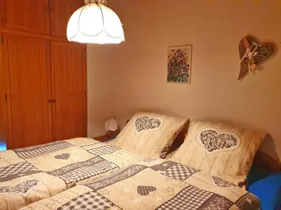 Ein Bett oder Betten in einem Zimmer der Unterkunft Alpenresidenz Ruda