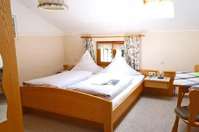 Ein Bett oder Betten in einem Zimmer der Unterkunft Bauernhof Ertlhof