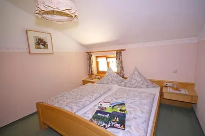Ein Bett oder Betten in einem Zimmer der Unterkunft Bauernhof Ertlhof