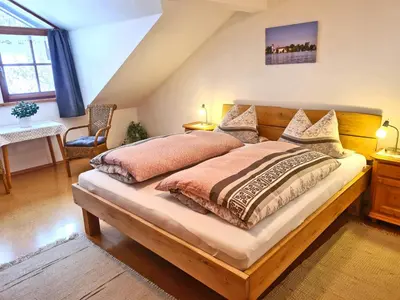 Ein Bett oder Betten in einem Zimmer der Unterkunft Ferienwohnungen Hamberger
