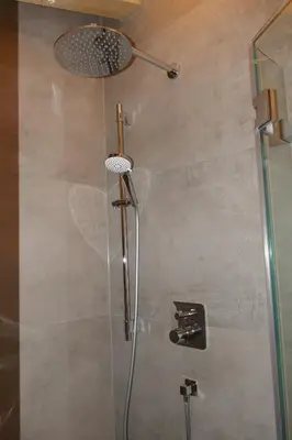 Ein Badezimmer in der Unterkunft Bodenschneid Suiten Neureuthblick