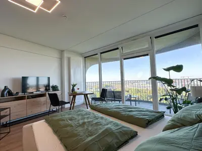 TV/Unterhaltungsangebot in der Unterkunft Helles Apartment mit tollem Blick über Augsburg