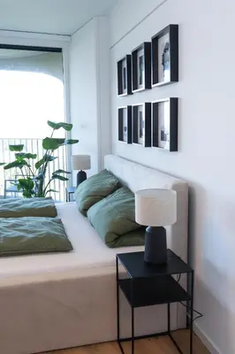 Ein Bett oder Betten in einem Zimmer der Unterkunft Helles Apartment mit tollem Blick über Augsburg