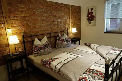 Ein Bett oder Betten in einem Zimmer der Unterkunft Ferienwohnungen Rosenhof