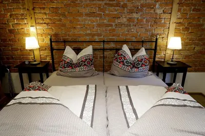 Ein Bett oder Betten in einem Zimmer der Unterkunft Ferienwohnungen Rosenhof
