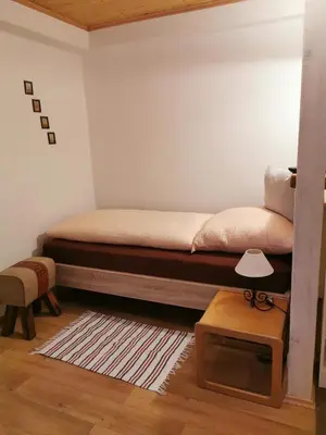 Ein Sitzbereich in der Unterkunft Gästezimmer Reitinger