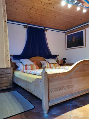 Ein Bett oder Betten in einem Zimmer der Unterkunft Gästezimmer Reitinger