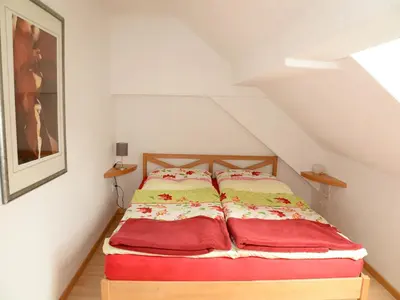 Ein Bett oder Betten in einem Zimmer der Unterkunft Mühle zu Waching