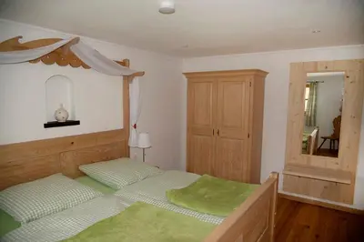 Ein Bett oder Betten in einem Zimmer der Unterkunft Mühle zu Waching