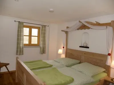 Ein Bett oder Betten in einem Zimmer der Unterkunft Mühle zu Waching