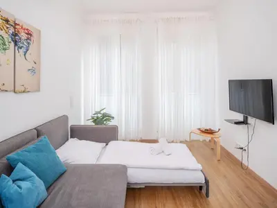 Ein Bett oder Betten in einem Zimmer der Unterkunft Great Studio