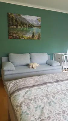 Ein Bett oder Betten in einem Zimmer der Unterkunft Südländische Flair