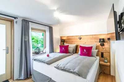 Ein Bett oder Betten in einem Zimmer der Unterkunft Seeheimat Ferienwohnungen