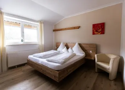 Ein Bett oder Betten in einem Zimmer der Unterkunft Gästehaus Kling