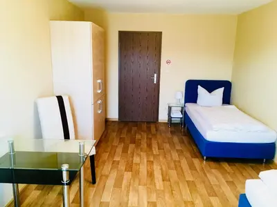 Ein Bett oder Betten in einem Zimmer der Unterkunft Gasthof Schrätzenstaller