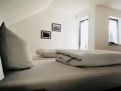 Ein Bett oder Betten in einem Zimmer der Unterkunft Gasthof Schrätzenstaller