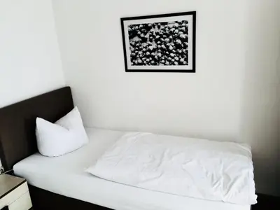 Ein Bett oder Betten in einem Zimmer der Unterkunft Gasthof Schrätzenstaller