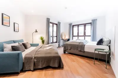 Ein Bett oder Betten in einem Zimmer der Unterkunft Eddy's Rest & Relax - Neuhausen