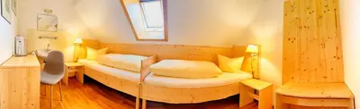 Ein Bett oder Betten in einem Zimmer der Unterkunft Gasthof Graf