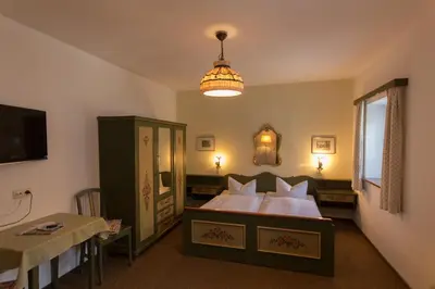 Ein Bett oder Betten in einem Zimmer der Unterkunft Landhaus Griessee