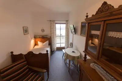 Ein Bett oder Betten in einem Zimmer der Unterkunft Landhaus Griessee