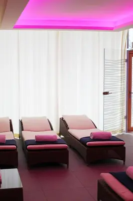 Ein Sitzbereich in der Unterkunft Ammerseehäuser