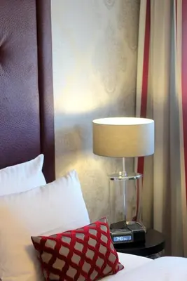 Ein Bett oder Betten in einem Zimmer der Unterkunft Parkhotel Heidehof Long Stay