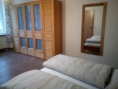 Ein Bett oder Betten in einem Zimmer der Unterkunft Ferienwohnung Kopold 