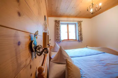 Ein Bett oder Betten in einem Zimmer der Unterkunft Ferienwohnung Berghof