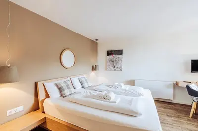 Ein Bett oder Betten in einem Zimmer der Unterkunft Apartment Bergtraum - modern, zentral und ruhig gelegen